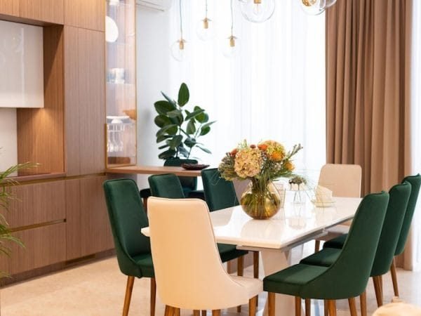 20230803163928_fpdl.in_modern-dining-room-with-cozy-green-beige-armchairs-vase-flowers-white-table-interior-design-soft-selective-focus-artistic-noise_182920-2021_medium-qadbve6qs